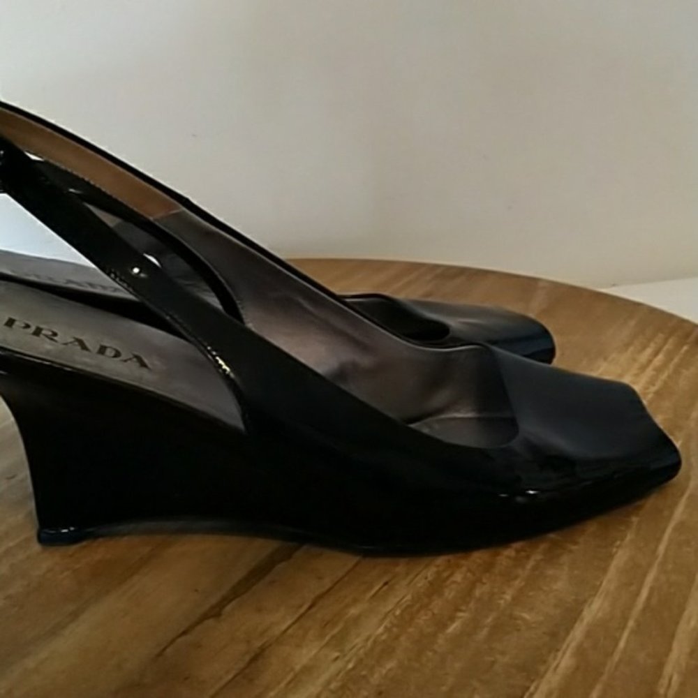 Prada patent peep toe wedges made in Italy